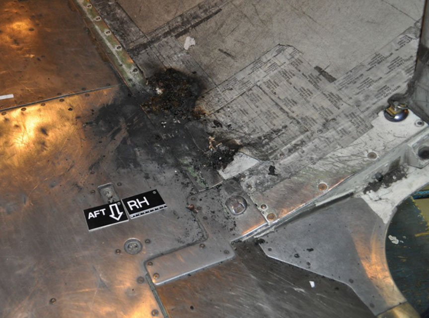 Fire damage to lower aft cargo compartment
