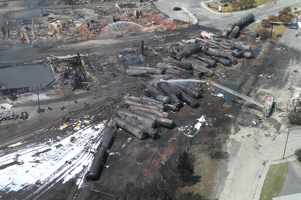 Aerial view of charred freight train in Lac-Megantic