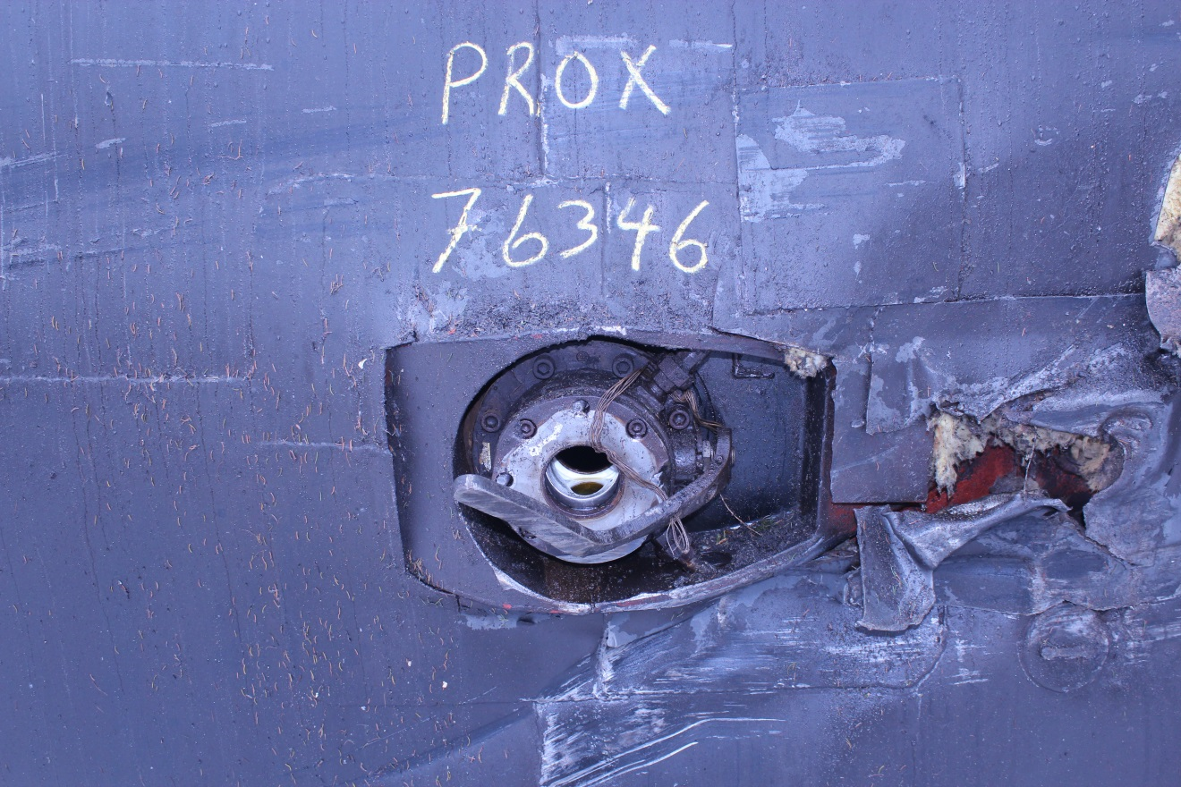 Photo 5. Robinet de déchargement par le bas partiellement ouvert et levier de manœuvre plié sur le wagon PROX 76346