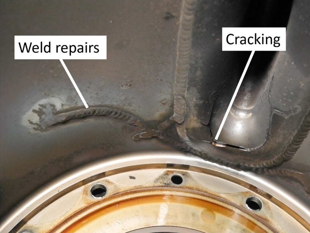 Figure 6. Welding repairs and cracks on the occurrence exhaust diffuser (Source: National Transportation Safety Board of the United States)